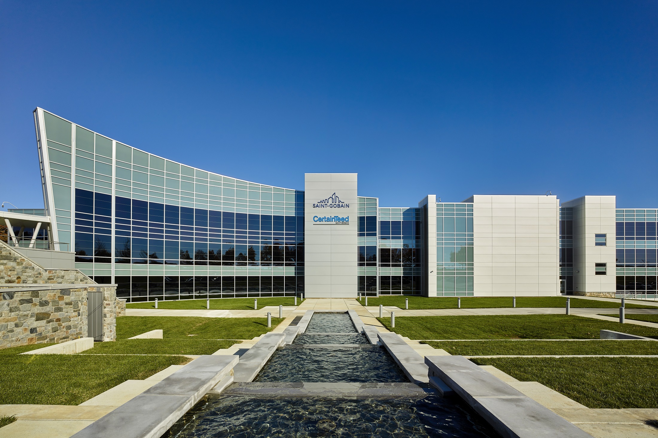 Corporate office building with Saint-Gobain and CertainTeed logos in the center