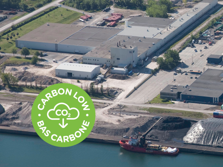 Aerial view on Montreal plant with a green logo that says Carbon Low